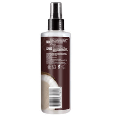 Desert Essence product texture drop illustrating lightweight coconut oil finish