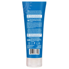 Desert Essence conditioner on bathroom shelf suggesting daily use benefits
