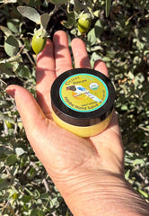 Desert Oasis Skincare open jar texture melting on fingertip for easy absorption