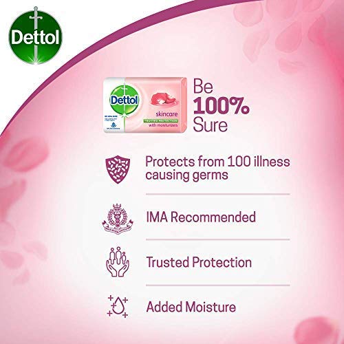 Hand holding Dettol soap to show scale and easy handling