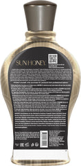 Devoted Creations texture swipe displaying creamy honey-like lotion hydrating skin