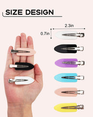 DF DUALFERV clip in hand for scale, compact lightweight and portable