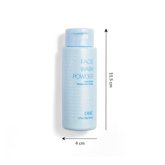 DHC jar held in hand for scale demonstrating compact 1.7 oz portability benefit