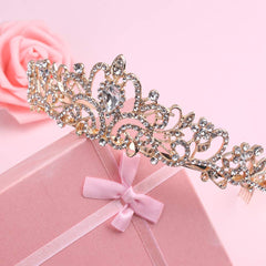 Didder tiara held in hand for scale and comfortable wear
