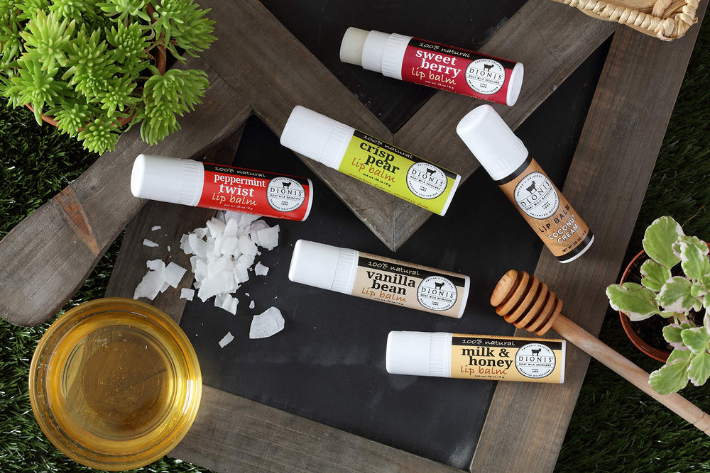 Dionis lip balm applied from hand, demonstrates easy on-the-go nourishment