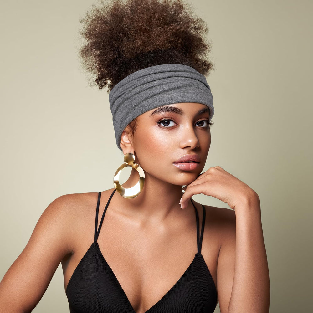 DiyJibb model wearing headband during yoga showing secure non-slip benefit