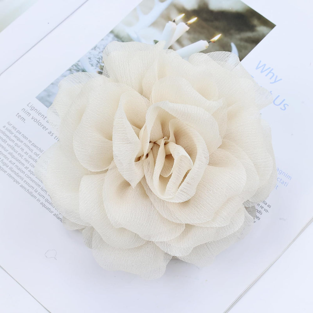 Dizila hair claws styled at a wedding setting showing romantic accessory appeal