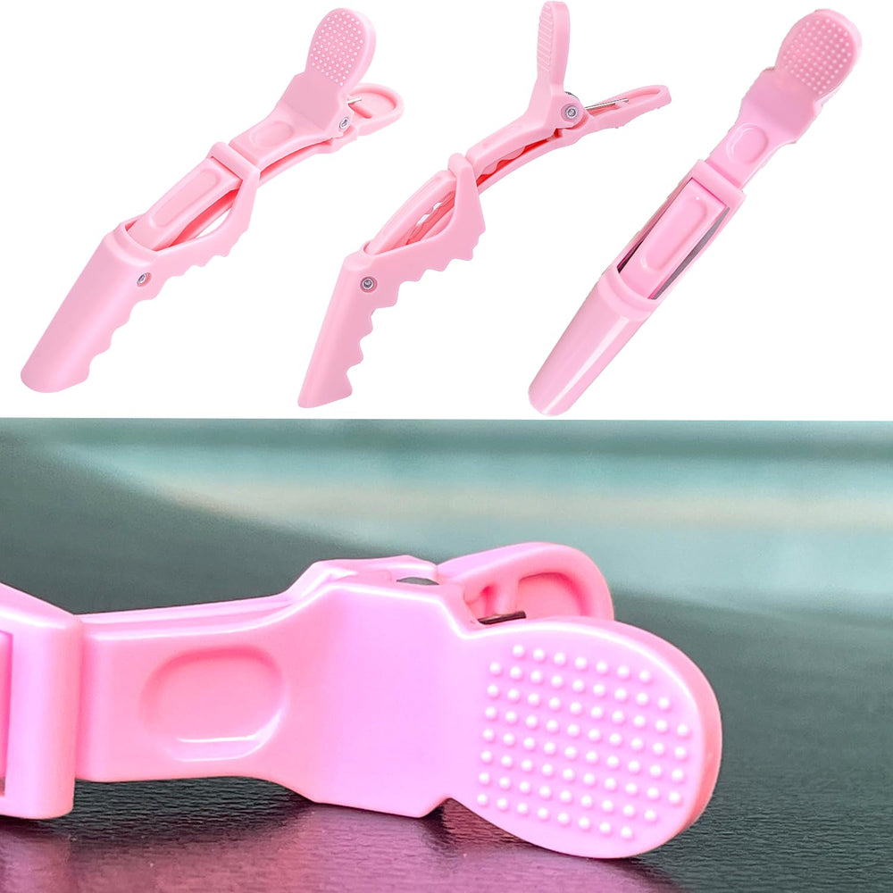 Dkpyt clip in hand for scale showing compact size and travel convenience