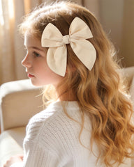 doboi flat-lay of all eight bows in packaging showing gift-ready presentation and coordination
