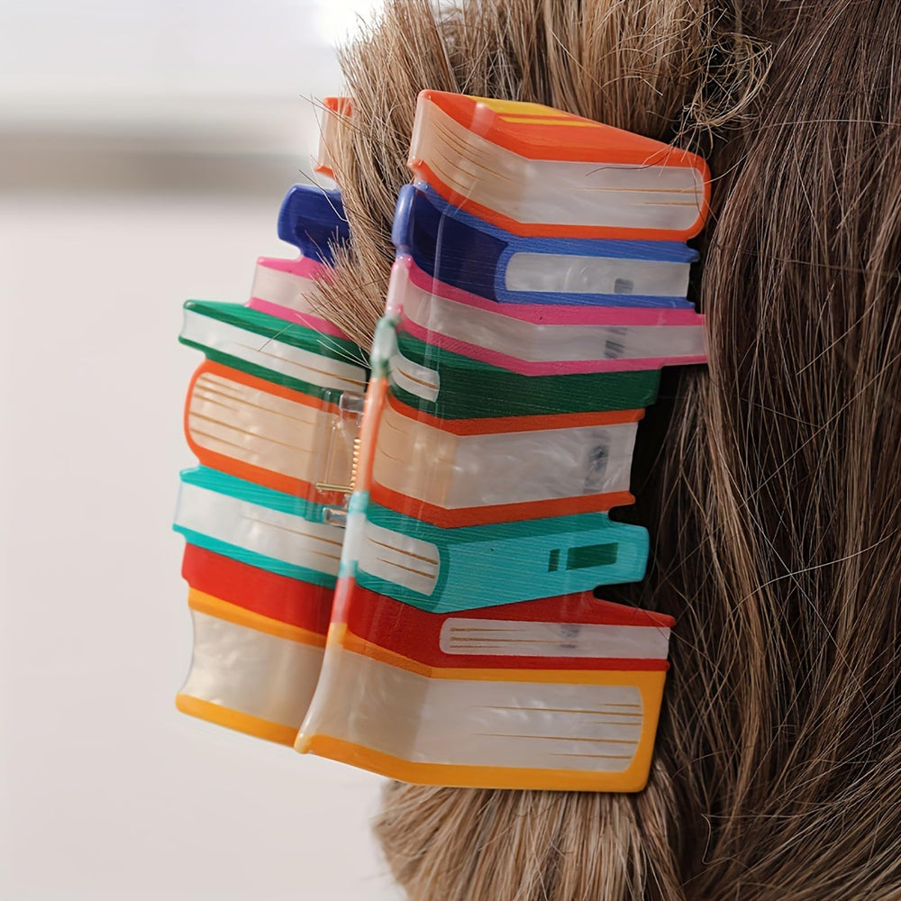 Doneace front view of book-shaped clip showing colorful design and secure hold