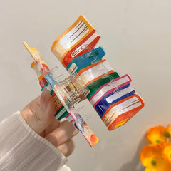 Doneace clip holding fine hair in a half-up style for comfortable all-day wear