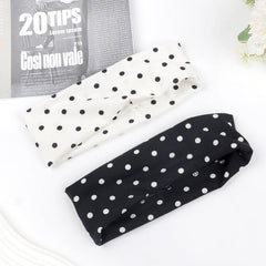 Doneace flat lay of both polka dot patterns showing matching set versatility