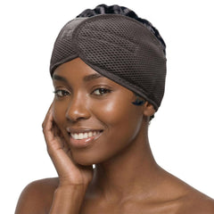 DONNA headband front view showing sleek black wrap and secure hold benefits