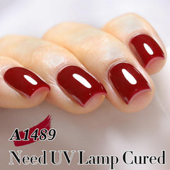 Double Rhythm on a model's nails showing glossy finish and wearable translucent color
