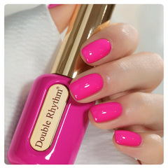 Double Rhythm front packaging showing hot pink jelly color and elegant presentation