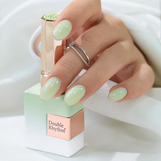 Double Rhythm front bottle view showing milky green shade and glassy finish benefit