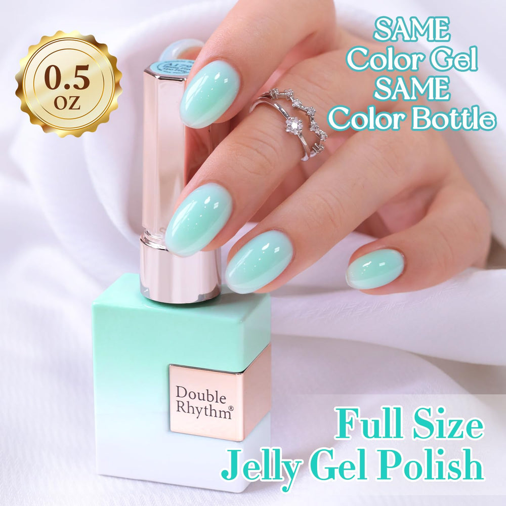 Double Rhythm painted nails in use illustrating wearable milky teal and natural look