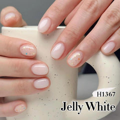 Double Rhythm bottle in hand to show 15ml scale and travel-friendly size for DIY mani