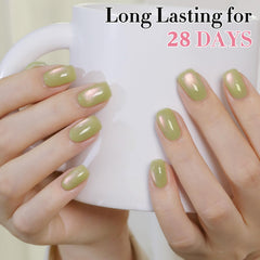 Double Rhythm applied on nails with visible green shimmer delivering salon results