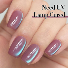 Double Rhythm swatch on hand displaying translucent plum holographic shimmer