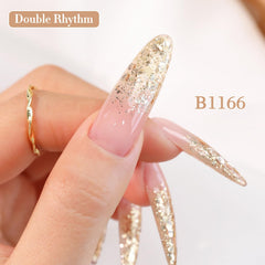 Double Rhythm next to coin for scale showing compact 15ml size for travel-friendly convenience