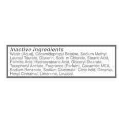 Dove 18.5 oz bottle next to towel illustrating product size and contents