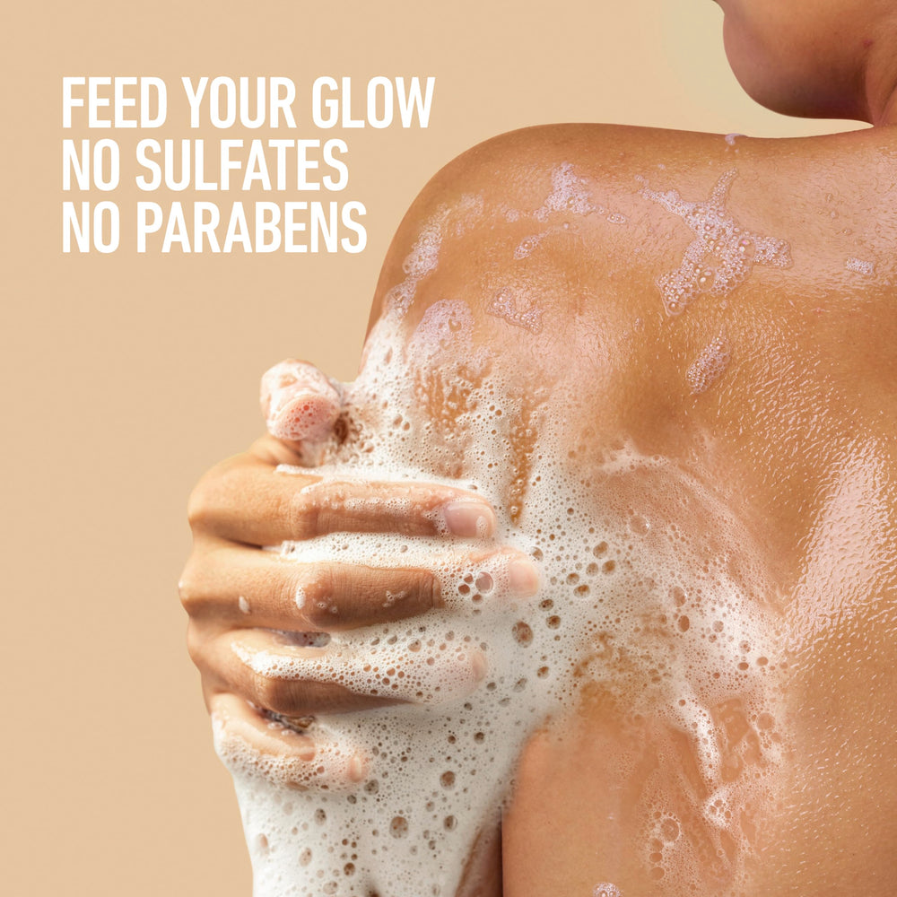Creamy white lather from Dove body wash showing soft skin hydration benefit