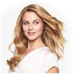 Dove coconut & hydration applied in shower to wet hair, demonstrating easy detangling benefit
