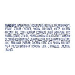 Coconut halves beside Dove bottle emphasizing coconut oil ingredient and moisturizing effect