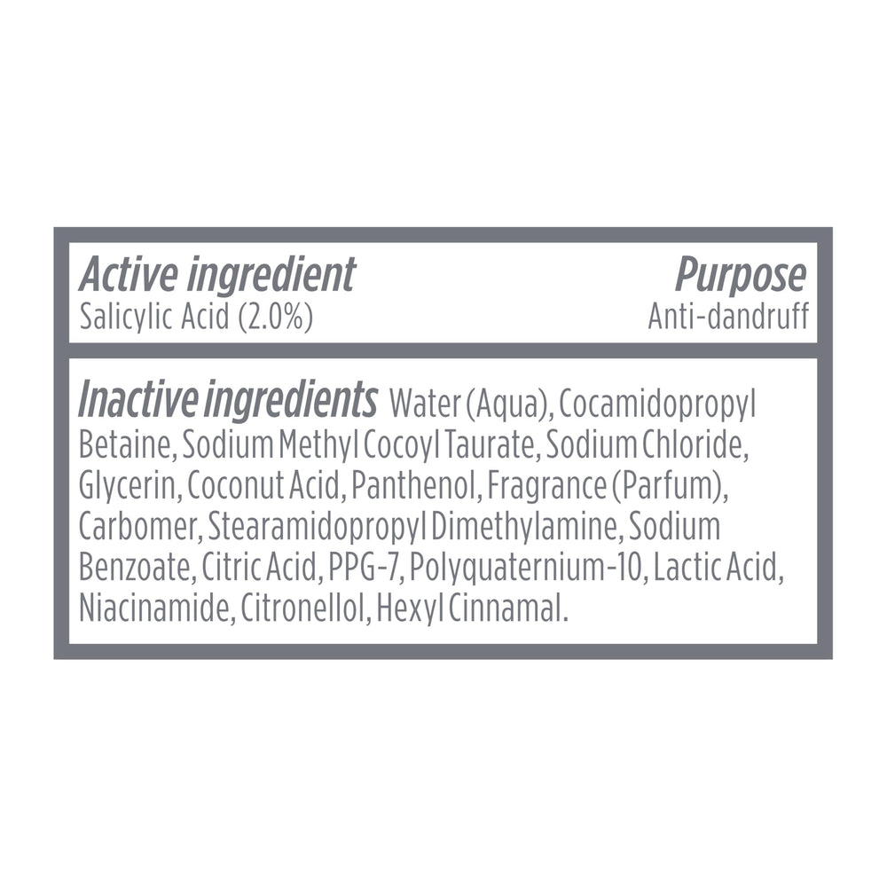 Dove Derma Scalp bottle on bathroom shelf among toiletries, suggesting routine use