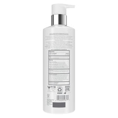 Dove bottle dispensing shampoo, demonstrating easy application and control