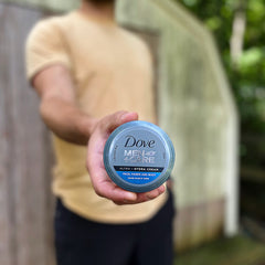 Dove Men+Care cream applied on hand demonstrating immediate hydration benefit