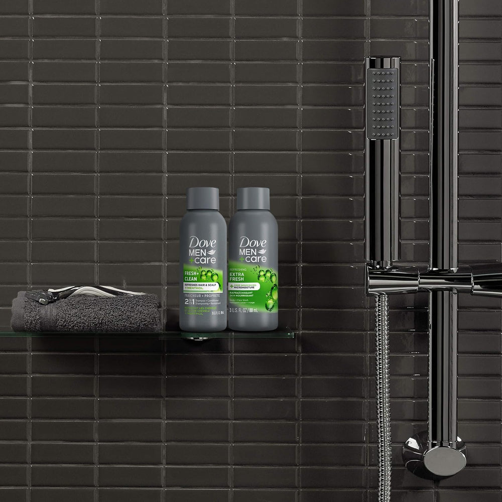 Dove Men+Care bottles in hand showing travel friendly 3 oz size