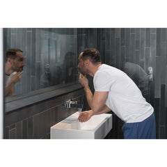 DOVE MEN + CARE bottle being used in shower showing easy rinse
