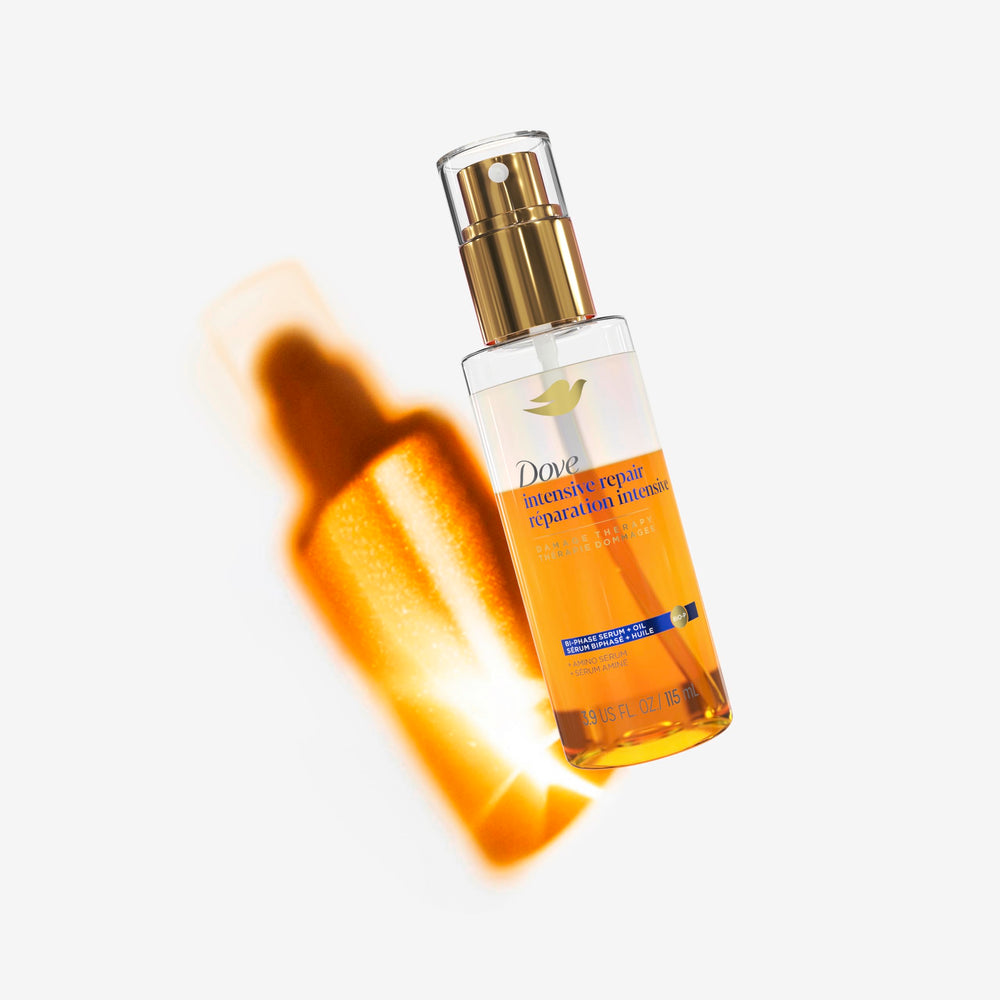 Dove applying serum to mid-lengths and ends for targeted repair