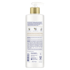 Dove shampoo lather in hand demonstrating gentle cleansing and foam