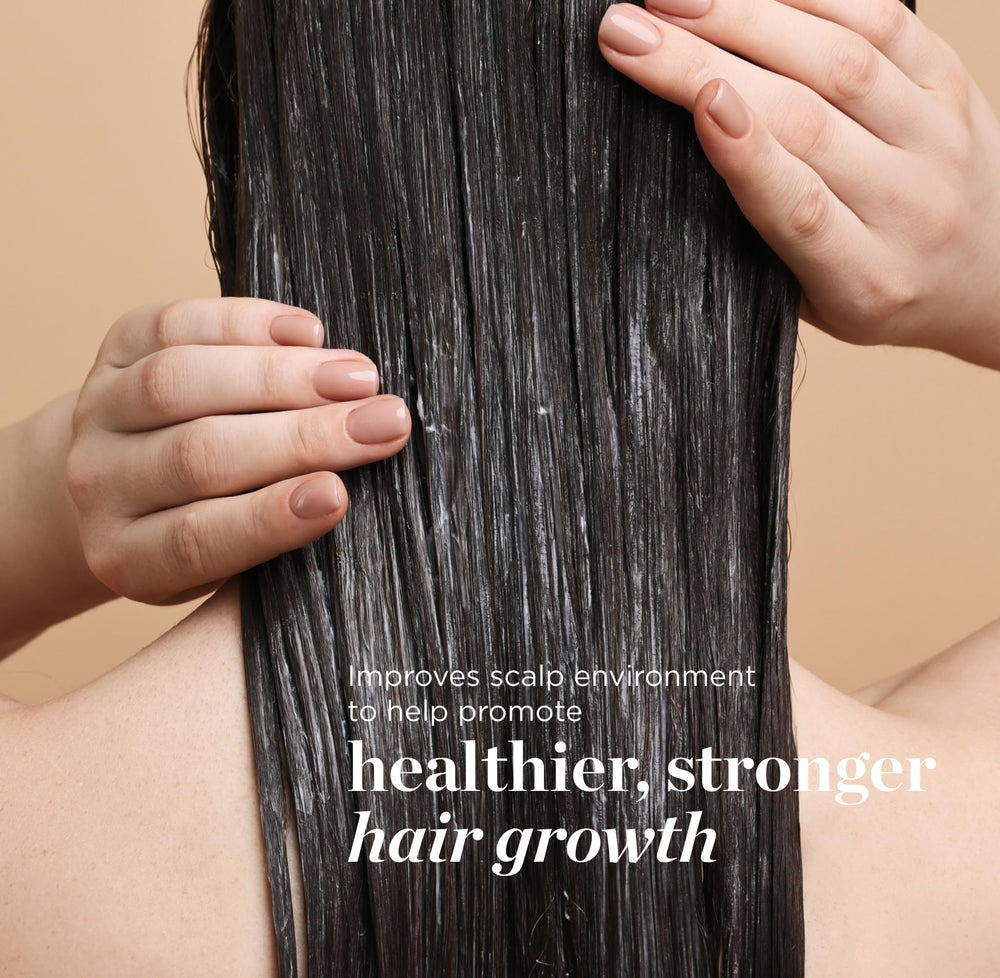 Dr. Groot bottle beside color-treated hair demonstrating safety