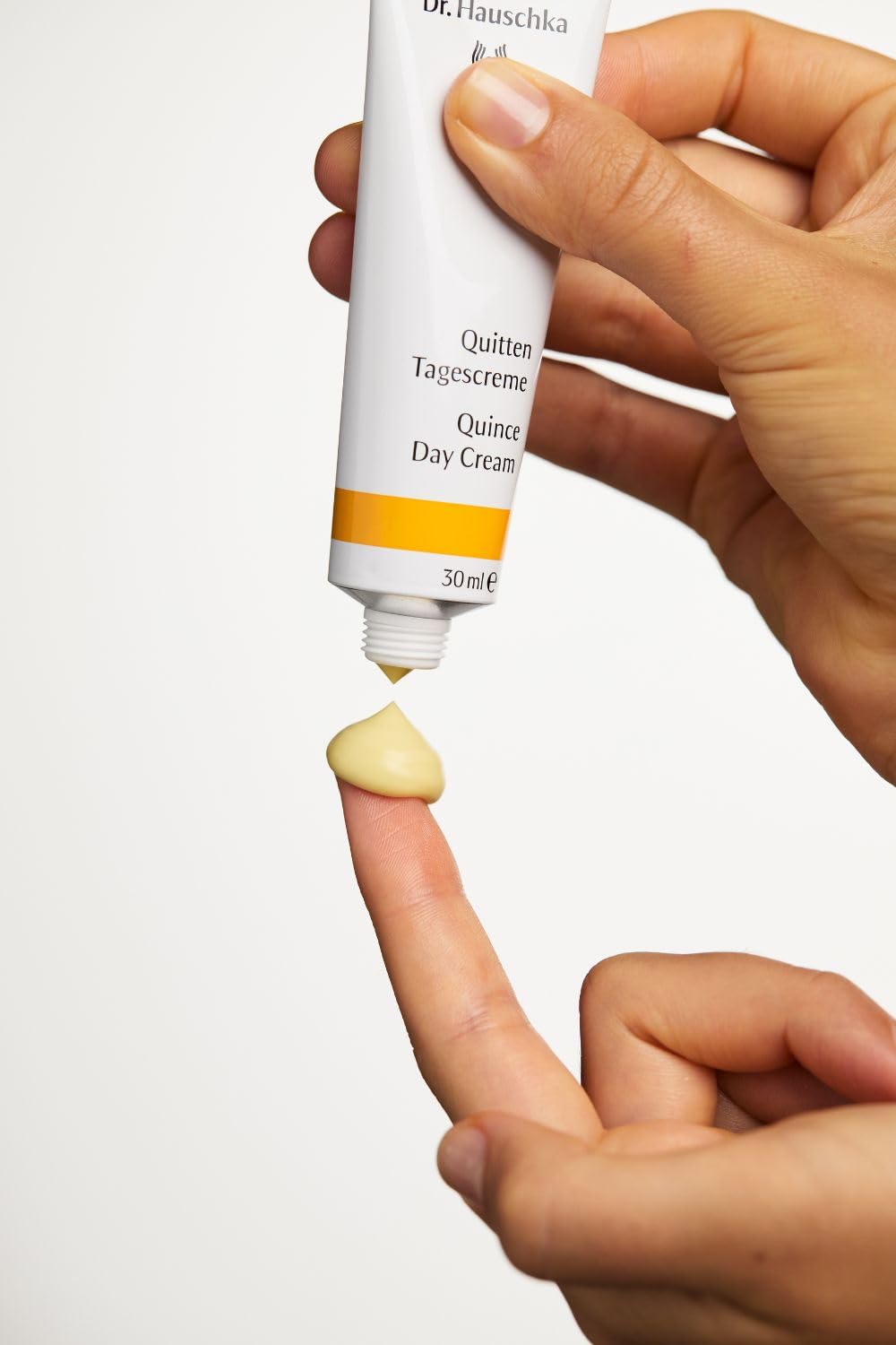 Dr. Hauschka Quince Day Cream on a bathroom shelf showing tidy daily skincare routine