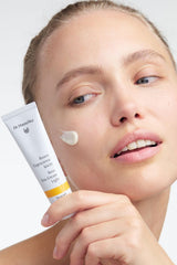 Dr. Hauschka Rose Day Cream Light next to a ruler for scale indicating the compact 1 fl oz size