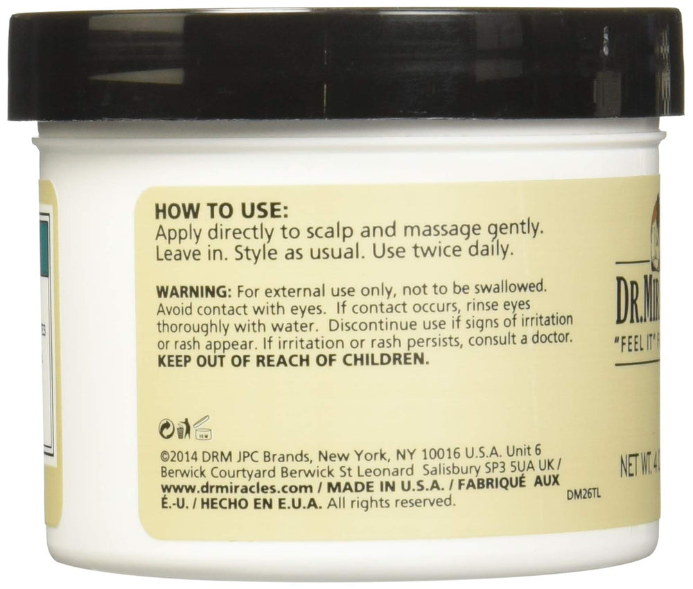 Dr. Miracle's creamy texture close-up showing rich emollients and easy spread for smooth, hydrated hair