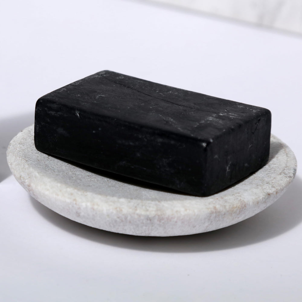 Lifestyle bathroom scene with Dr. Natural soap promoting calm morning routine