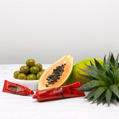Dr. PAWPAW ORIGINAL BALM ingredient close-up with pawpaw and aloe highlighting soothing benefits