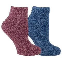 Dr. Scholl's front packaging in pink showing product pair and features, comfort benefit