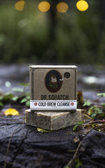 Dr. Squatch sliced soap piece displaying grounds and natural appearance for use