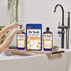 Dr Teal's bottle beside Epsom salt soak portraying paired ritual