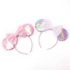 DRESHOW ear and bow detail showing firm attachment and neat stitching