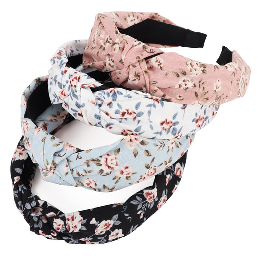 DRESHOW front view of four floral headbands showing prints and packaging benefit of variety