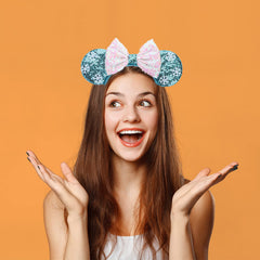 DRESHOW model wearing headband at theme park showing photo-ready sparkle