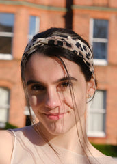 DRESHOW knotted headband front detail adding a stylish focal point