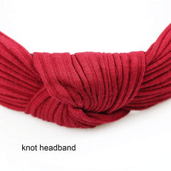 DRESHOW headband used while applying makeup showing hair kept tidy benefit